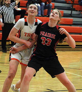 Sage Elven battles for rebounding position at Troy.