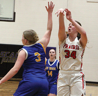 Kylie Schumacher hits a 3 at the end of the first half.