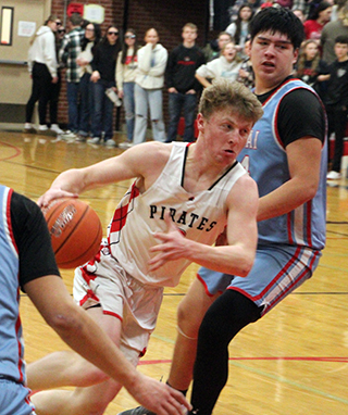 Matt Wemhoff drives toward the hoop against Lapwai.