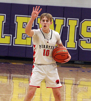 Phil Schwartz lets his teammates know they are running play #4 against Lapwai in the District 2nd place game.