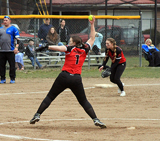 Kaylie Lockett, who was a catcher when Prairie last had a softball team in 2022, is now a pitcher. The team showed improvement as the game went on with some nerves leading to errors in the first couple of innings. Also shown is Halee Rowland at third base.