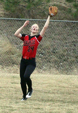 Catherine Seubert make a catch in centerfield.
