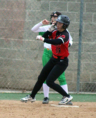 Kenly Forsmann pulls into third with her second triple against Potlatch.