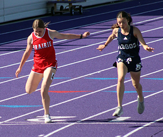 Sydney Shears was edged at the finish of the 1600 by a Logos runner but broke her own school record.