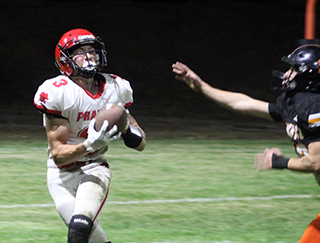 Cooper Riener catches a pass and then turned and made it to the end zone for his second touchdown against Kendrick. Riener scored all 3 touchdowns Prairie has scored against the Tigers in the past two seasons.
