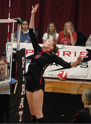 Kylee Riggers reaches for the ball against Lapwai.