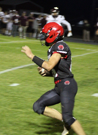 Kade Quintal breaks into the secondary on his way to a 94 yard touchdown run near the end of the first half.
