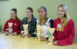 Alex Chance, Kayla Uhlenkott, Vanessa Hylton and Myken Dahlen with stackable clowns built for pre-schoolers.