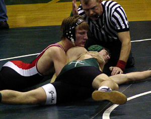 Shane Poxleitner wins this match against a St. Maries opponent on his way to winning his weight class.