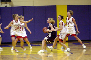 The Lady Pirates defend against Kamiah. From left are Lacey Wargi, Karel Wassmuth, Kayla Holthaus and Briget Long.