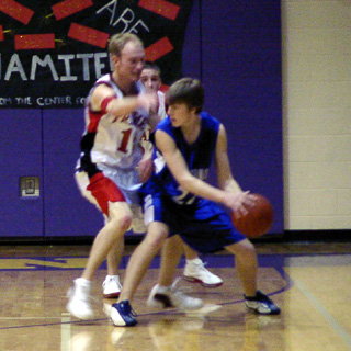 Brent Frei plays defense against Orofino at District.