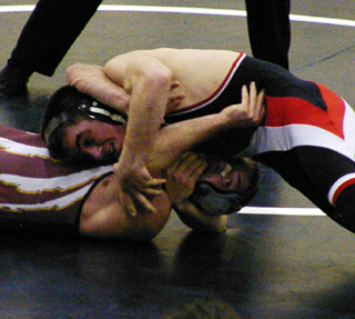 Nick Uhlenkott scores the match winning points against a Kamiah opponent.