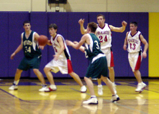 The Pirates play defense against Potlatch.