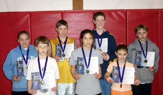 Most of the KC Hoop Shoot winners are shown.