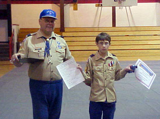 Kyle Bruegeman, with scoutmaster Bob Behler, was the overall winner of the Pinewood Derby.
