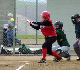 Karel Wassmuth takes a swing.