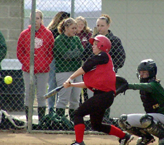 Kayla Holthaus is about to connect with a pitch.