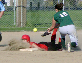 Lacey Wargi gets a face full of dirt on a head-first slide into second on a steal.