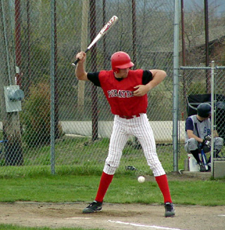 Chad Arnzen backs out of the way of an inside pitch.