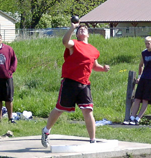 J.D. Riener competes in the shot put.