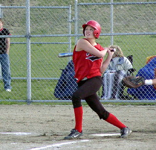 Lacey Wargi watches a ball go foul.