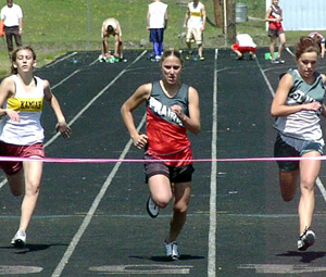 Nicole Nida wins the 100 meter dash final.