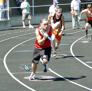 Joe Peneku gets off to a good start in the 4x100 relay.