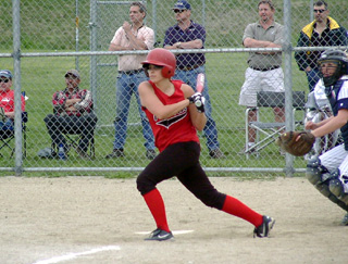 Karel Wassmuth rips one of her two hits against Grangeville.