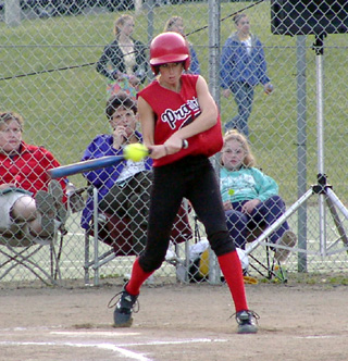 Ashley Schaeffer connects against Orofino in the championship game.