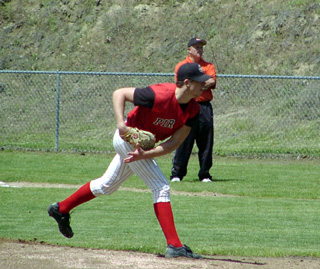 Matt Baerlocher pitches against Malad. He was named to the all-tournament team.