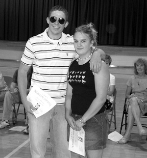 Matt Baerlocher and Maureen Tacke received US Army Scholar-Athlete Awards and USMC distinguished athlete awards. Tacke also is PHS's NASSP Wendy's High School Heisman nominee.