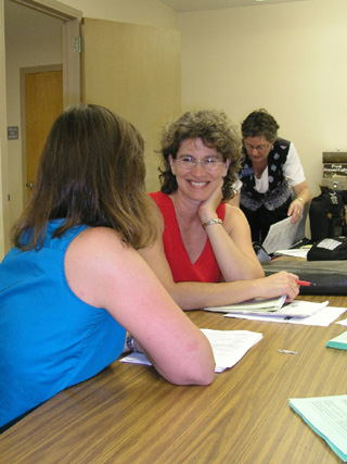 Candy Lang, CVHC, helps with enrollment to the CHIP B program.