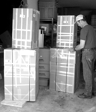 Floyd Blue Whitley with some of the shipping boxes.