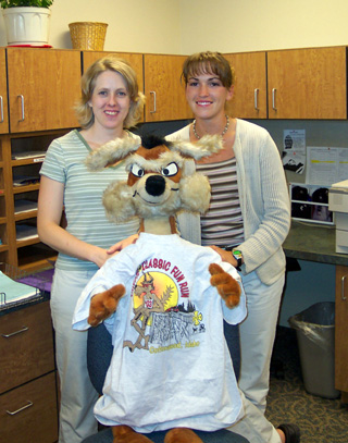 Michelle Kehler and Trina Geis with Wile E. Coyote, mascot for the Coyote Classic