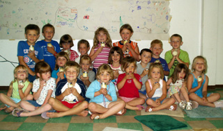 Bear Cubs Matthew Jungert, Seth Chaffee, Frank Spencer and Wolf Cub Drew Cochran with their launching equipment.