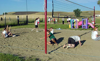 The Prairie volleyball team does some conditioning work in the sand courts at Wimpy's.