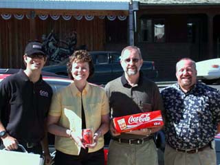 Beth and Tim Forsmann with Coca-Cola representatives.