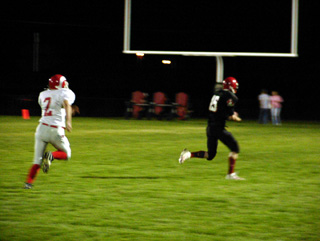 Phil Henry got behind the defense and took this pass 53 yards for a touchdown.