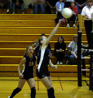 Ashley Schaeffer reaches for a spike at Timberline.