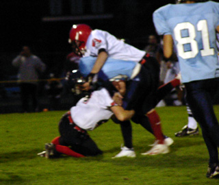 Prairie defenders double team a Lapwai runner.