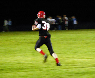 James Hood heads for the endzone on a 77 yard pass play for Prairie's only score.