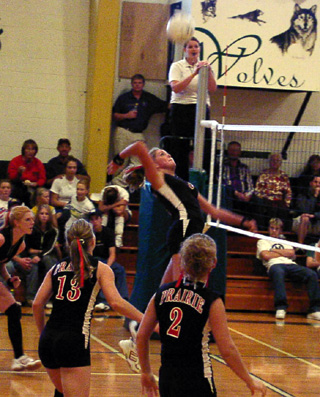 Briget Long winds up for a kill in District action.