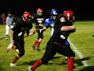 Eric Lerandeau heads for the end zone and Prairie's first TD of the game.