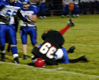 James Hood makes a tackle.