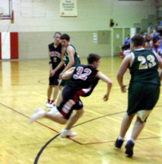 Sean Daley handles the ball at the Jamboree. In the background is Seth Crane.
