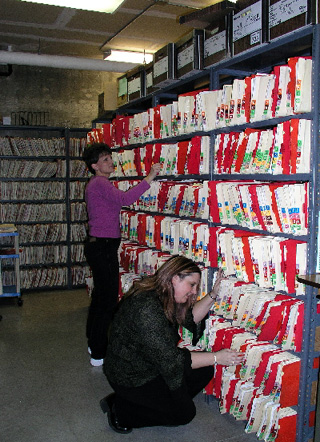 Pictured in the CVHC clinic chart room are Gayla Cotten, Chart Room Supervisor and Toni Goodwin.