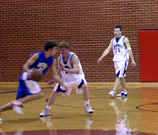 Mark Uhlenkott and Shane Wemhoff play defense against NICS on Saturday.