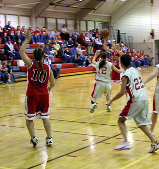 Tiffany Schaeffer passes to a wide open Meghan VanderPas.