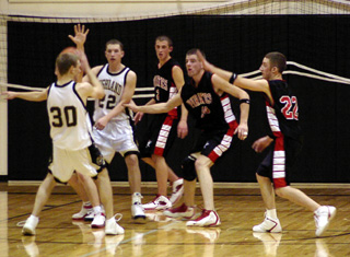The Pirates play defense at Highland.