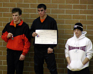 Nick Uhlenkott on the podium with his gold medal.
